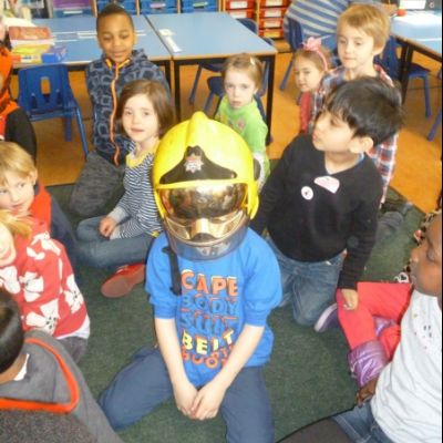 Trying on the fireman's helmet  in Class 1_2R